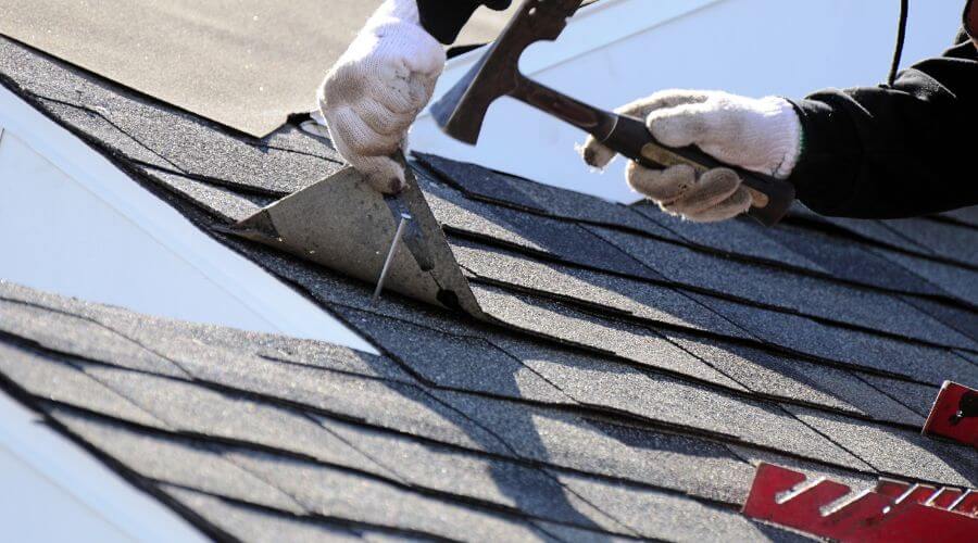Expert tile roof repair services in Bellmont, IL
